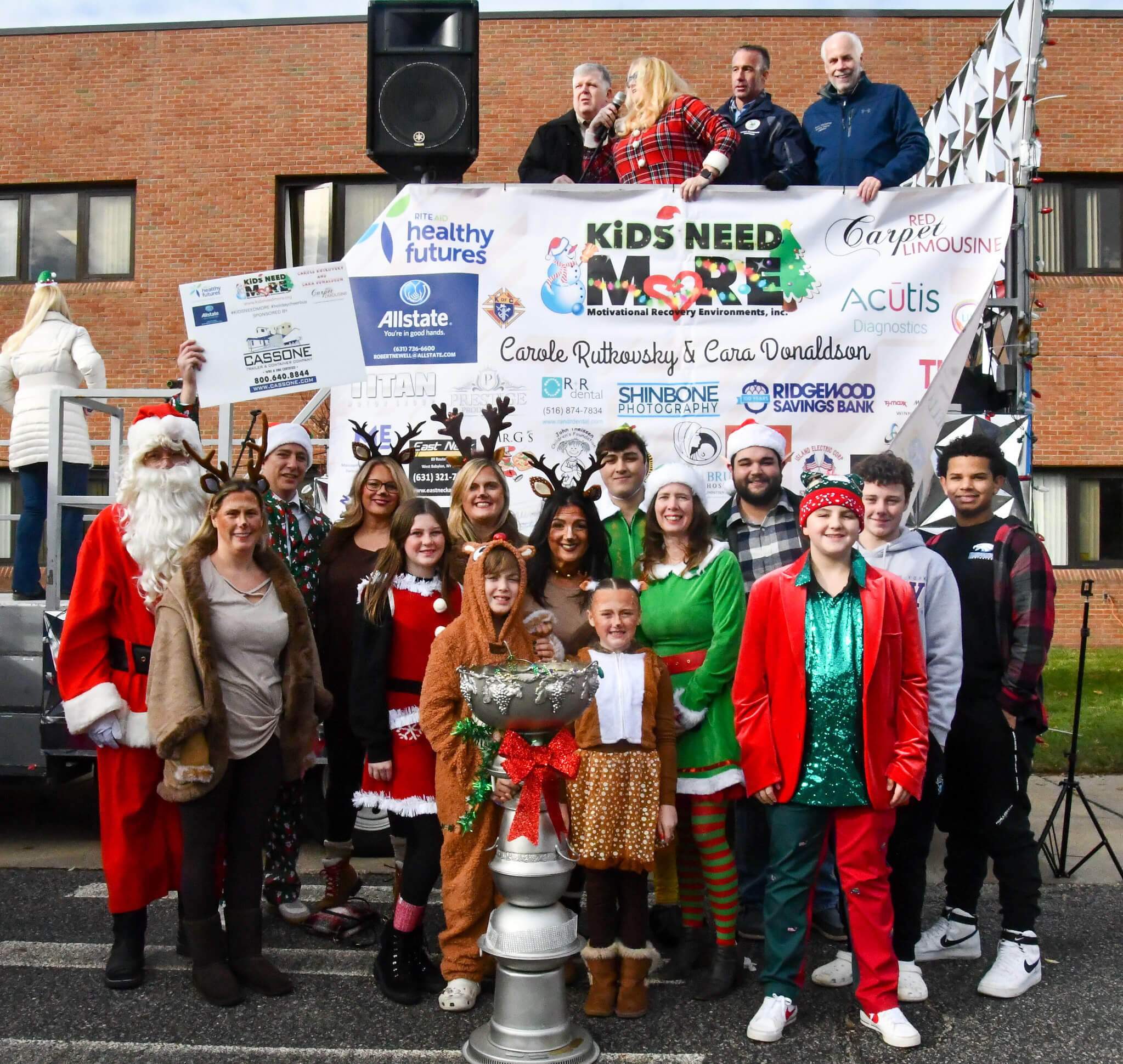 Image 10 The 8th Annual KiDS NEED MoRE Holiday Cheer Bus Elf Ride