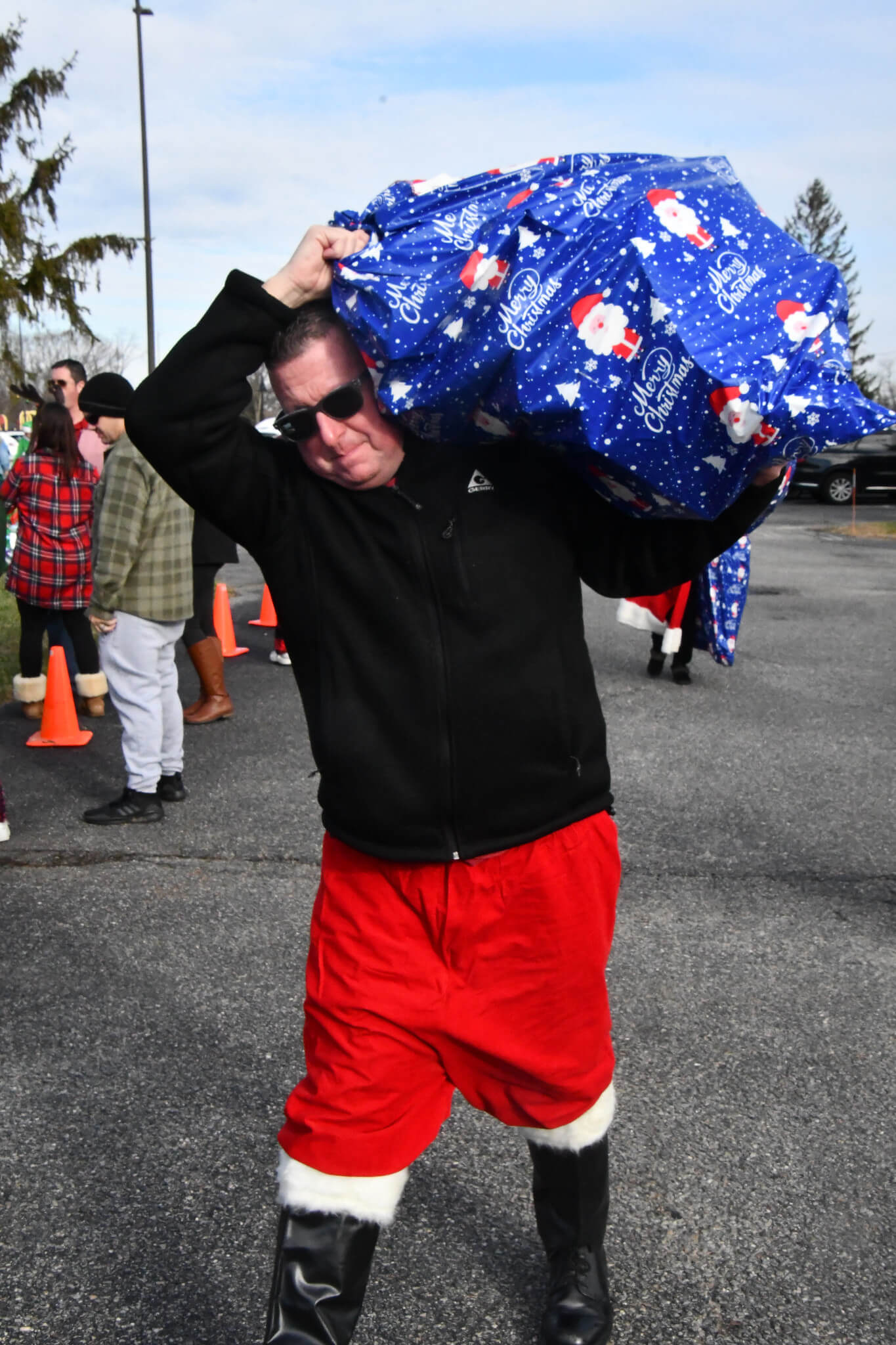 Image 13 The 8th Annual KiDS NEED MoRE Holiday Cheer Bus Elf Ride