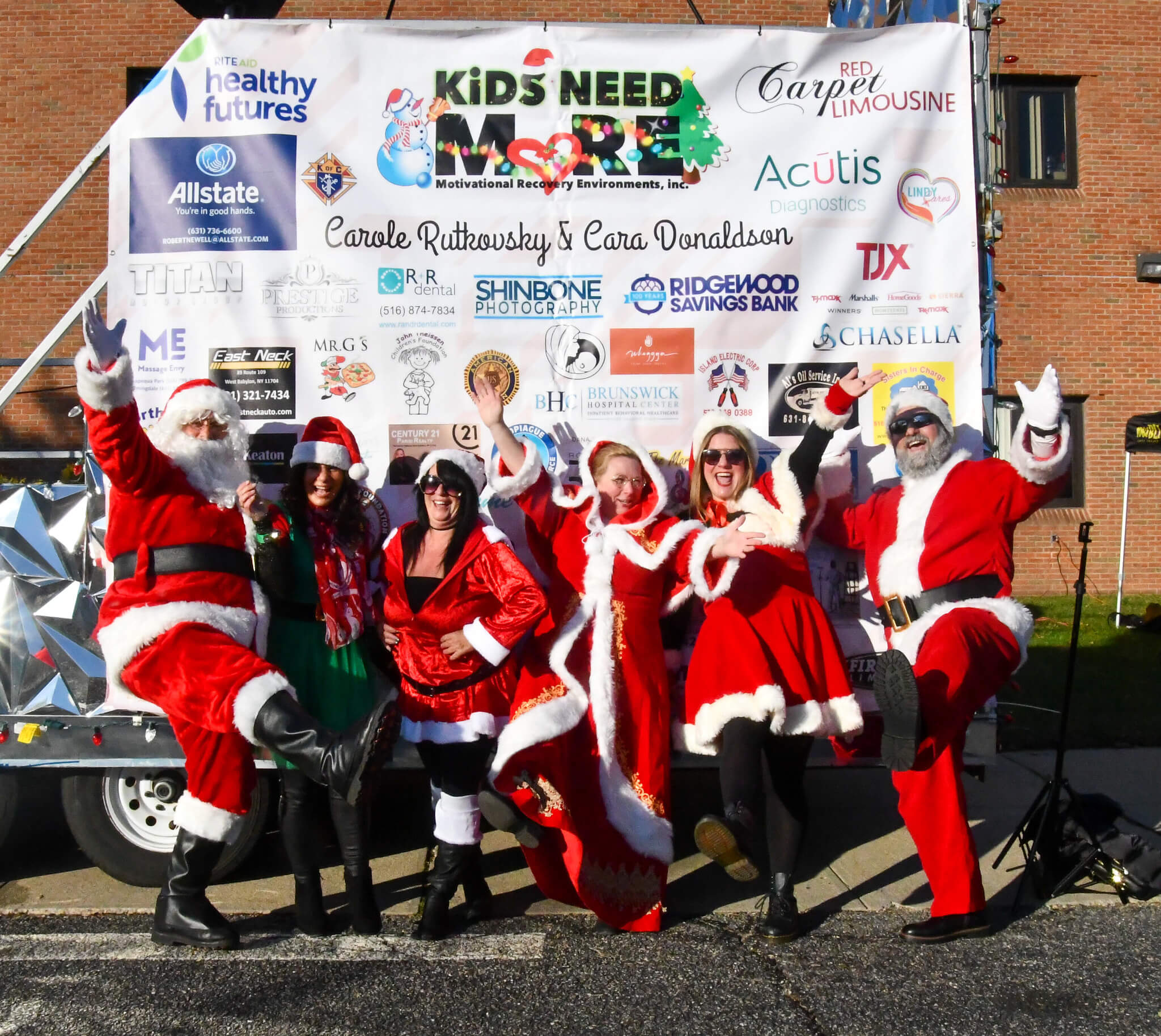 Image 8 The 8th Annual KiDS NEED MoRE Holiday Cheer Bus Elf Ride