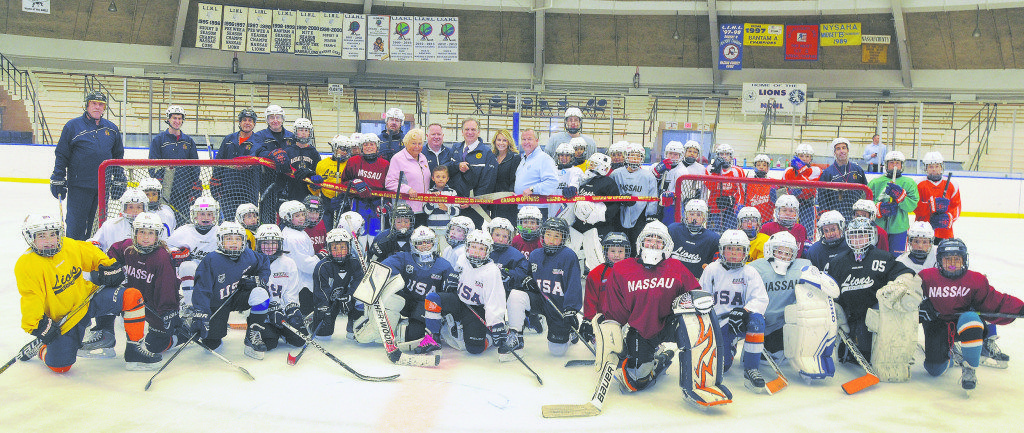 Nassau County Executive Ed Mangano and county legislators Rose Marie Walker and Laura Schaefer join Cantiague Park Ice Rink officials and youth hockey players to celebrate the rink’s 50th anniversary and a recently-completed facelift.