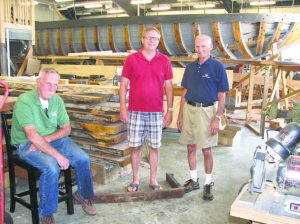 From left: Project manager Ed Peterson, port captain Billy Shephard and his dad William Shephard, a volunteer