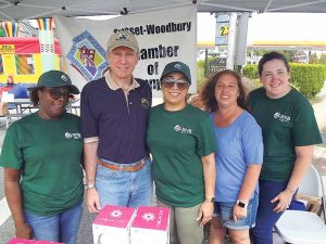 Members of the Syosset-Woodbury Chamber of Commerce with chamber president Chanbir Kaur (center) (Photos by Chris Boyle)