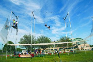 First time flyers learn how to swing from their knees, and do a blackflip off the bar. (Photos by Alex Nunez)