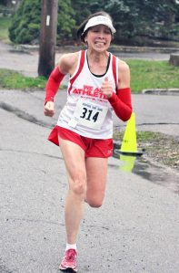 Pamela Lee of Syosset was a study in determination as she headed for the finish line.