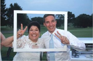 Stella, cofounder of Spectrum Designs,   poses with honoree Senator Jack Martins.