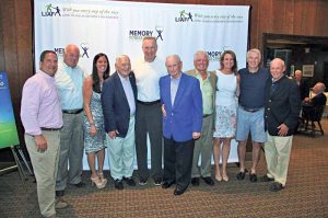 St. John’s University Men’s Basketball Head Coach Chris Mullin (center) with members of the LIAF Golf Committee, from left: Todd Hesekiel of Plainview, Tom Rogers of Melville, Tori Cohen of Old Bethpage, Joe Saggesse of Manhasset, Steve Hess of Manhasset, Ed Galvin of Great Neck, Christine Rice of Garden City, Paul Eibeler of Glen Cove and Tom Killeen of Manhasset at the 23rd LIAF Golf Outing.