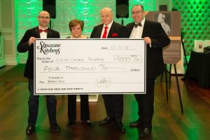 Anthony Starck Fran Noto John Starck Sr and John Starck Jr. with Check 1024x683 1