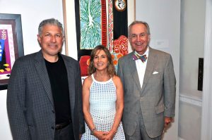 Dr. Todd and Jill Cohen with Franklin Hill Perrell, guest curator of The Moderns: Long Island Collects Modern Art. They are shown with a work the Cohens loaned to the exhibition, Nice-Travail et Joie, a 1947 work by Henri Matisse. (Photo by Tab Hauser)