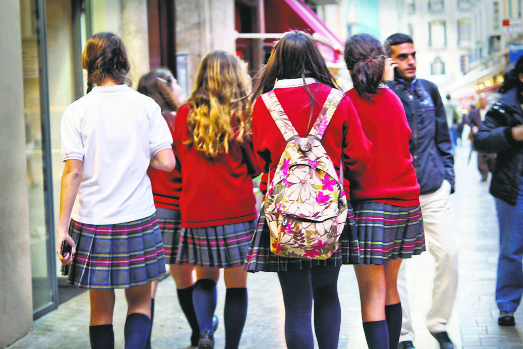Advocates of school uniforms say it prevents distractions and promotes unity, while opponents say it stifles self-expression.