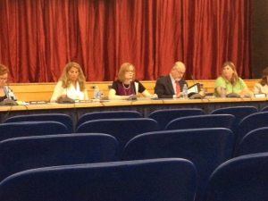 Dr. Kathleen A. Mooney, superintendent of schools, addressing the meeting. From left, Board President Karen Sloan, Superintendent Mooney, board member Alan Baer, board member Elizabeth Weisburd