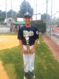Plainview's Dylan Banner with the Home Run Derby trophy