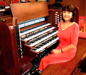 Feuss at the organ she plays at the Congregational Church of Manhasset