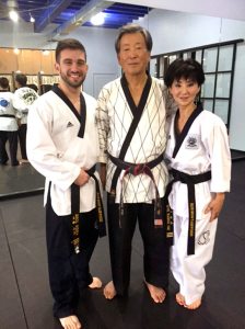 Grandmaster Lee, 9th Dan Black Belt, with Instructor Erol Mema and Helen Oh following his Saturday morning vitality class