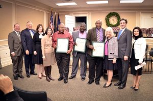 From left: Councilman Peter Zuckerman, Councilman Angelo Ferrara, Councilwoman Lee Seeman, Councilwoman Dina De Giorgio, Walter Nixon, Carl Weber, Jeffrey Dumpson, Supervisor Judi Bosworth, Town Clerk Wayne Wink, Jr. and Councilwoman Anna Kaplan at North Hempstead Town Hall on Dec. 15