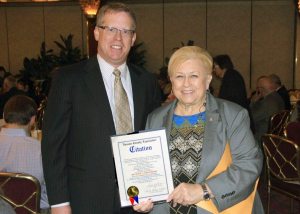 Judy Jacobs with Roslyn Chamber of Commerce honoree, Michael Grossberg 