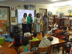 Students gathered in the library to express their thanks to Island Harvest
