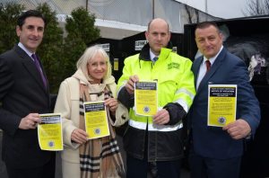 From left: North Hempstead Town Clerk Wayne Wink, Supervisor Judi Bosworth, Deputy Public Safety Commissioner Shawn Brown and Public Safety Commissioner Andrew DeMartin display the new Notice of Violation stickers.