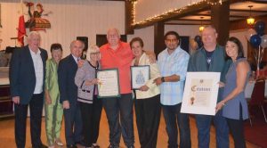 CSEA members receive awards from Town of North Hempstead Supervisor Judi Bosworth and Councilwoman and Pride in Port committee member Dina De Giorgio. Also shown are Parade Grand Marshal Fred Falconer and event co-chairs Barbara Faticone and Fred Pollack.