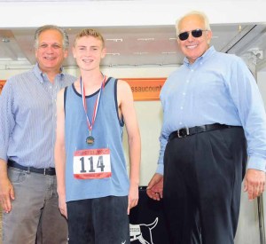 From left: County Executive Ed Mangano, winner Jake Meyers and CEO of America’s VetDogs Wells B. Jones