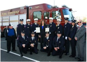 Legislator Ellen W. Birnbaum with members of the Vigilant Fire Company including Chief Josh Forst and Fire Captain Laurence Jacobs