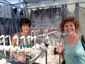 Roslyn resident Stacey Rothschild, left, with Sherry Lane, a vendor at the exhibit (Photo by Cynthia Paulis)