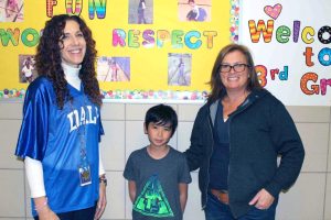 Daly School fourth grader Ian Laurence is congratulated by Principal Sheri Suzzan and his teacher, Nancy Flynn, for winning second place in the “Don’t Hide It, Flaunt It” essay contest. (Photos courtesy of the Port Washington School District)