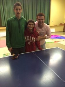 Jarred Allen (center) and two new friends