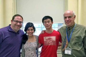 From left: North High NCTE winners Rachel Berkower and David Liu are flanked by English Teacher Scott Honig and Principal Bernard Kaplan.