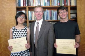 From left: South High NCTE winners Yiqing (Elissa) He and Benjamin Newman flank English Department Head Dr. David Manuel.