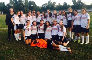 From left, back row: Coach Erik Connolly, Alexandra Mirro, Carly Weisen, Vanessa Lamoretti, Sabrina Sakhai, Leah Klempner, Amanda Shirazi, Julia Prager-Hessel, Claire Kivelowitz, Kayla Kamali, Maya Ran, Julia Steiner, Taylor Tehrani and Erica Levy; kneeling: Brixhilda Dacaj, Alexandra Lux, Gabrielle Berger, Ariel Uzan, Isabella Mirro and Julia Doppelt; front row: Joyce Gallo