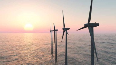Offshore wind farm at sunset