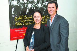 Former Great Neck resident Lou Diamond Phillips presented the Woman of Influence Award to director Patricia Riggen, whose film The 33 premieres this week. 