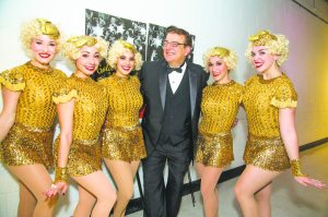Grammy-Award winning musician Vince Giordano, who received the Artist of Distinction Award in Music, is surrounded by The Honey Taps. 