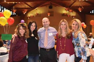 Melissa Halpern, Cynthia Litman, Rabbi Danny Burkeman, Hayley Foster and Macha Einbender have been discovering new ways to make people happier.