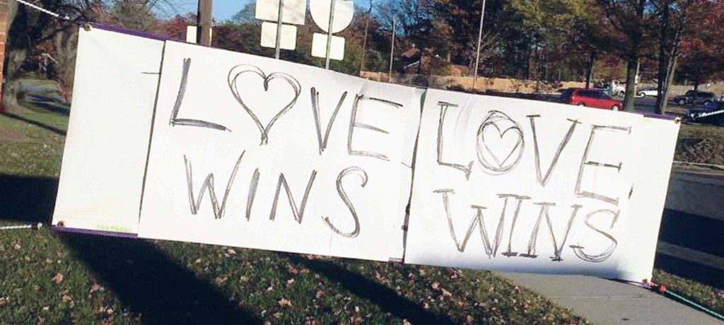 After a church’s sign was defaced with racist rhetoric in Maryland, church members came together to cover it up with a message of love. (Photo by the Episcopal Diocese of Washington)