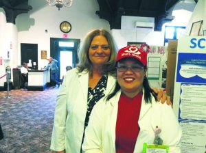 RNs Patricia Magnotta and Merlita Naval Mendoza work at North Shore with Paz Mejivar.