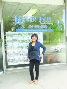 Lin Pan began selling real estate to earn some extra money for her family and, through hard work, now has her own agency. (Photo by Sheri ArbitalJacoby)