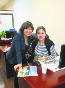 Lin Pan with coworker Teng Annie (Photo by Sheri ArbitalJacoby)