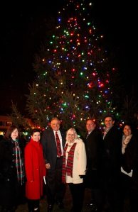Council Member Lee Seeman, Council Member Anna Kaplan, Council Member Angelo Ferrara, Supervisor Judi Bosworth, Council Member Peter Zuckerman, Town Clerk Wayne Wink and Council Member Dina De Giorgio at the Manhasset Christmas Tree Lighting.