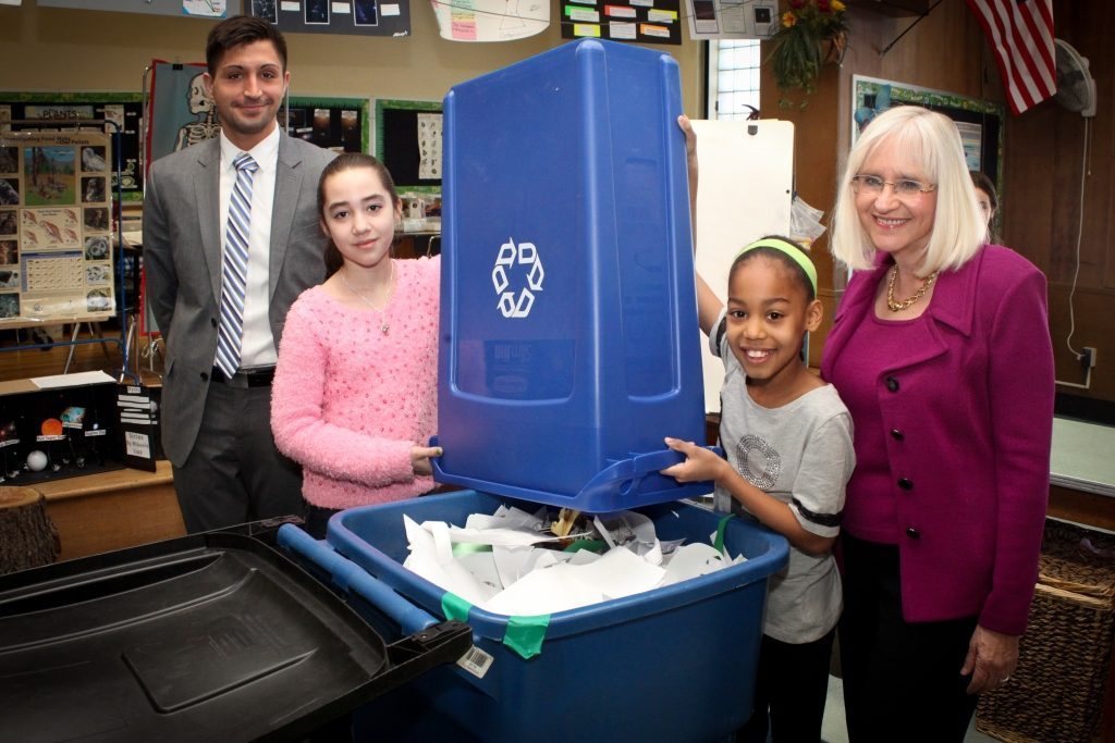 Supervisor Judi Bosworth and Recycling Coordinator Bill Karavasilis meet with students from the Saddle Rock School’s Recycling Program on March 6.