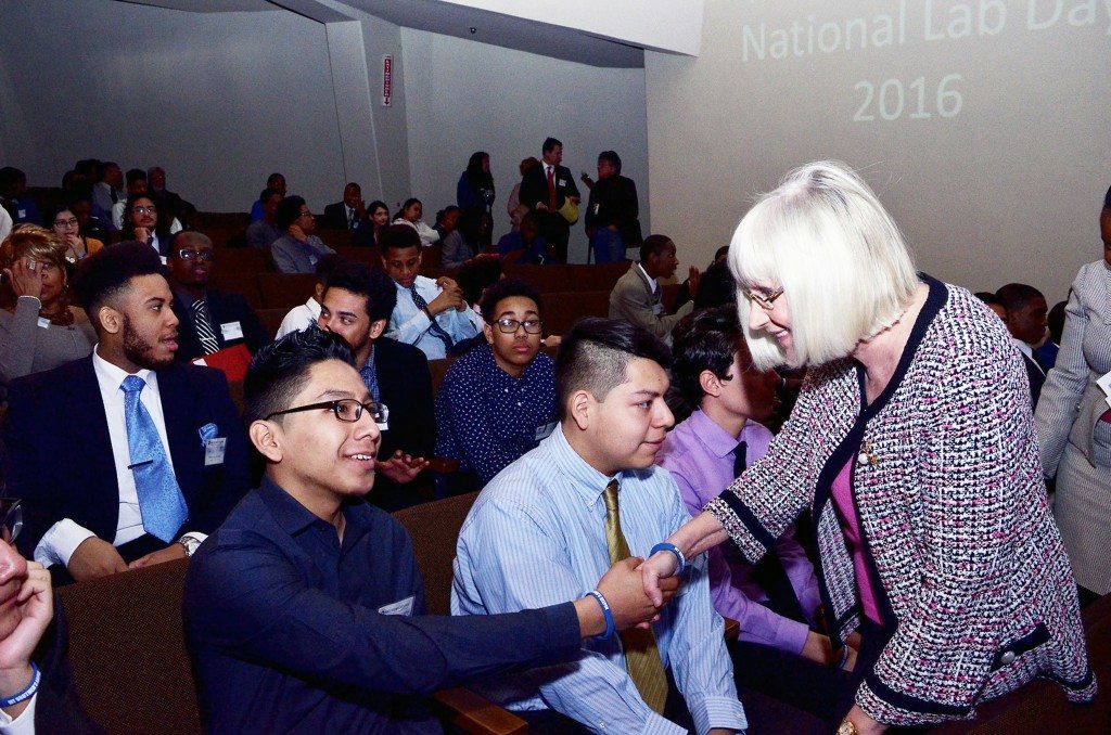 Supervisor Bosworth greets a mentee at the Brookhaven National Lab anniversary.