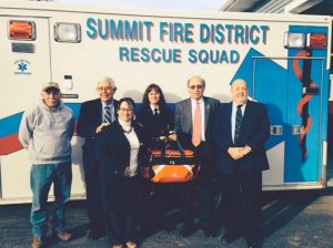 Chief Melszer, Jerry Rudnick, Schoharie Town Clerk & Schoharie Kiwanis President Indica Jaycox, Chairman Sandra Lynn Van Valkenburgh, John C. Lalena, & Secretary/Treasurer Paul Turner of the Summit Fire District.