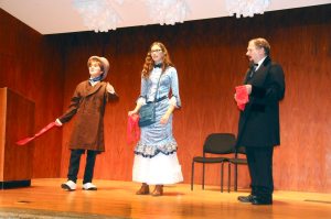 “Charles Dickens” (Mark Gamell) and Schreiber students Daliah Bernstein and Evan Gilmore