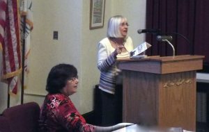 Town Supervisor Judi Bosworth (right) and Great Neck Historical Society President Alice Kasten discuss the lighthouse project.