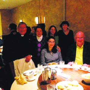 Pictured, from left (standing): Father Tafel, Bertha, Stacey from CLASP and Barbara Leopold, Lions Club president; (seated): Arpi from CLASP and John Ryan, president of CLASP.
