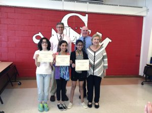 Front from left, Alison Mandel, Abigail Kapoor, Joanne Slalom, MWI’s Barbara  Goldstein; back from left, Salem Principal Christopher Shields, teacher John Talbot 