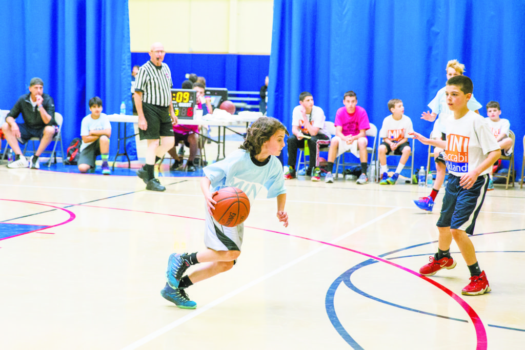 MaccabiBOn left, Ethan Hofman of Sid Jacobson Maccabi Team