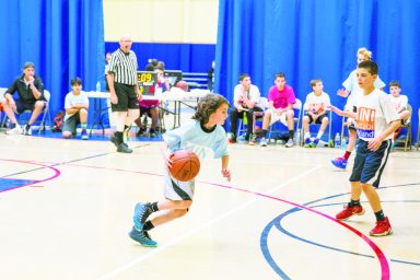 MaccabiBOn left, Ethan Hofman of Sid Jacobson Maccabi Team