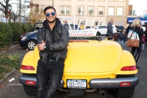 Jason Shurka in front of his family’s Hanukkah mobile