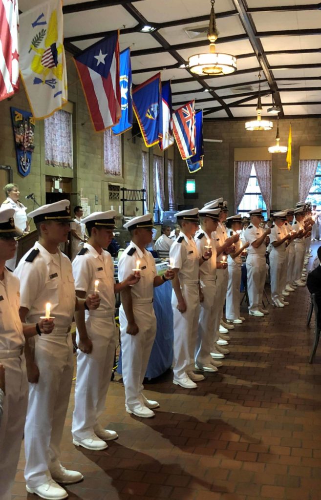 MerchantMarineHomecomingA Midshipmen conduct a candlelight vigil honoring the 142 Cadet-Midshipmen lost during World War II at the recent USMMA 75th Anniversary celebrati